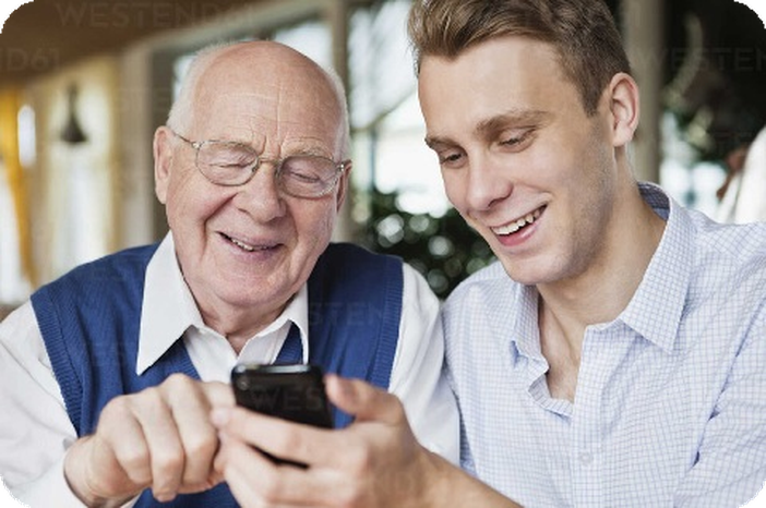 An elderly gentleman with his grandson